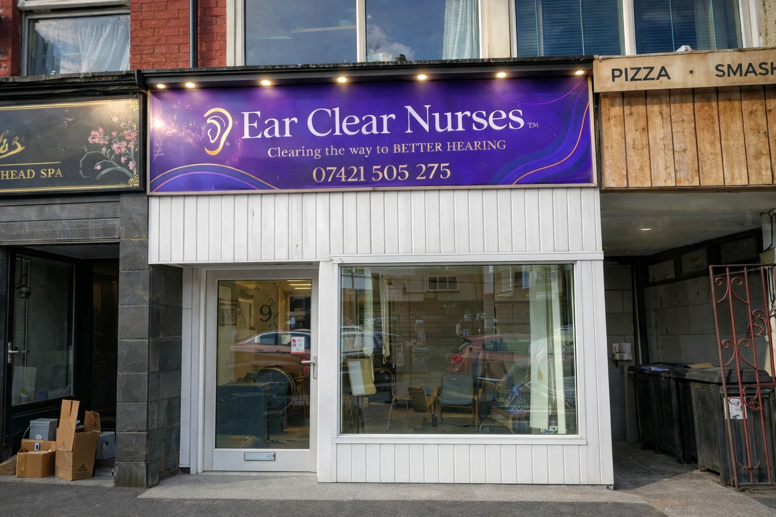 Qualified nurse providing professional ear care